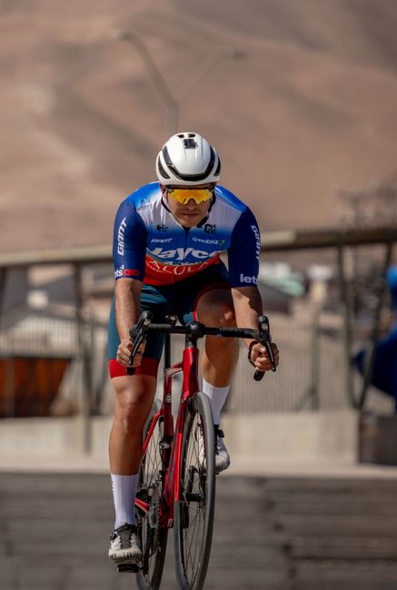 Focused cyclist racing outdoors in Alto Hospicio, Chile, showcasing intense sportsmanship.