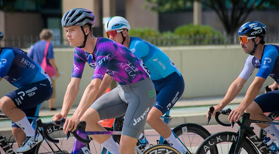 Energetic scene of cyclists competing in a race in Baltimore, showcasing athletic skill and endurance.